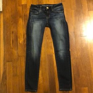 Dark colored jeans in good condition.
